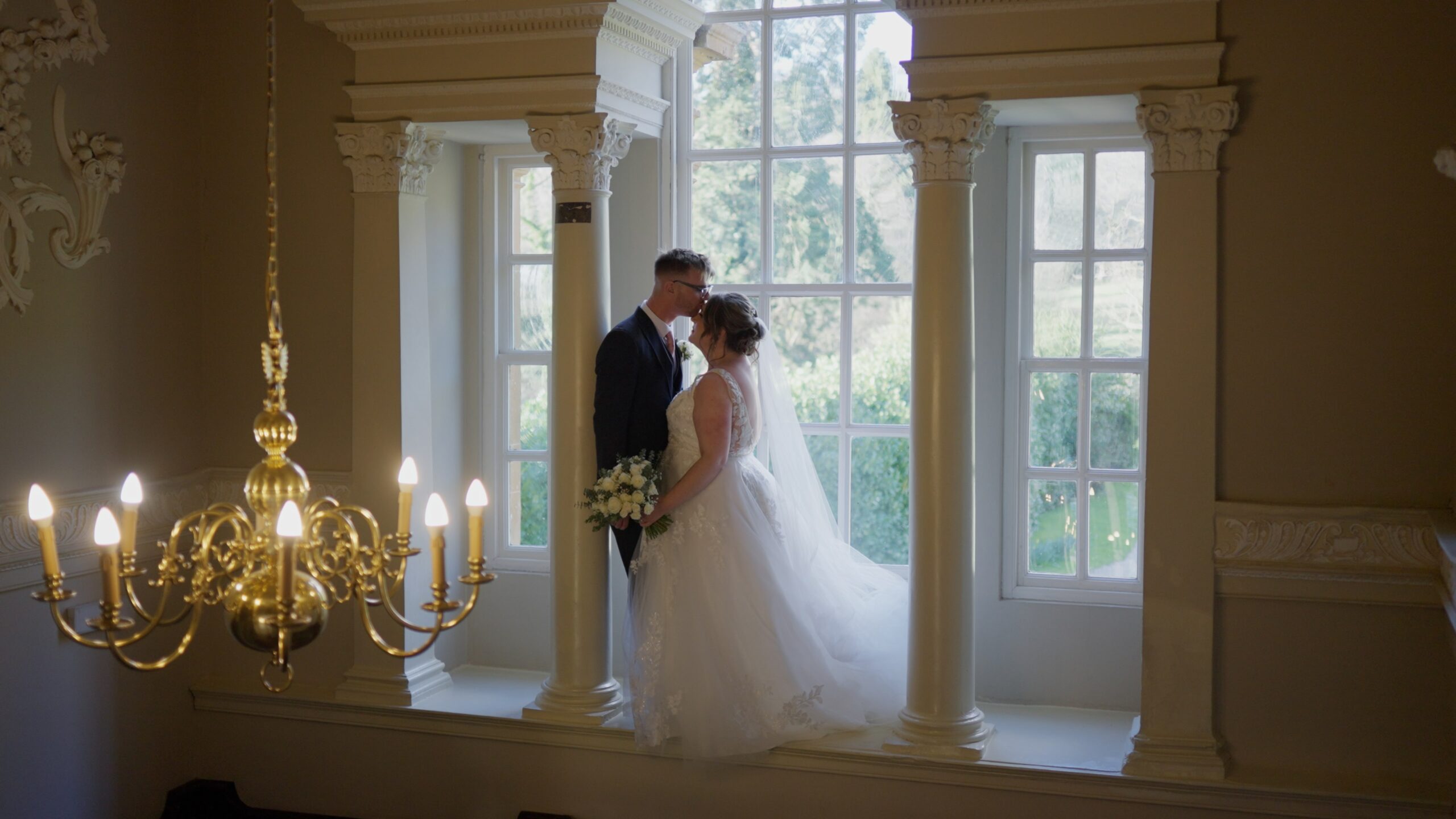 Kim & James in the grand window at the rear of crowcombe court.