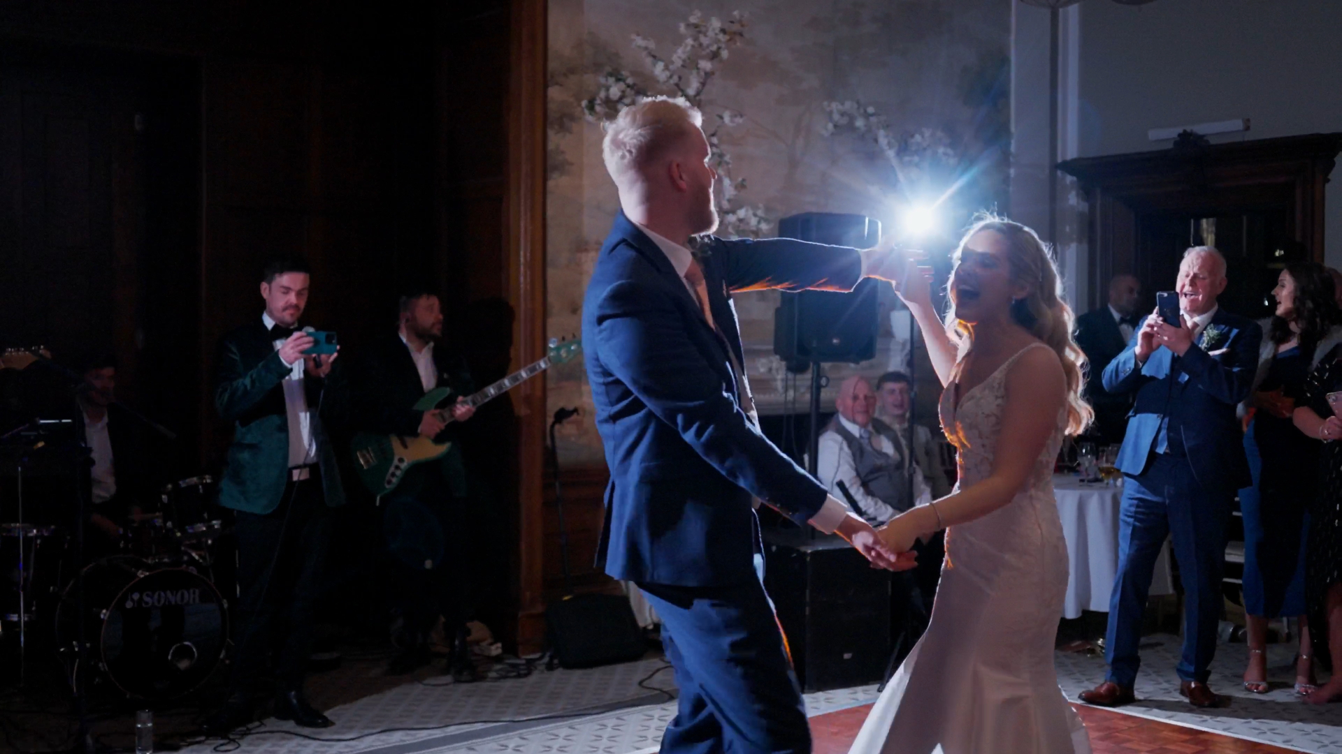 Bride and groom playfully dancing during their first dance — a joyful and unforgettable moment to capture in your wedding video by a Somerset wedding videographer