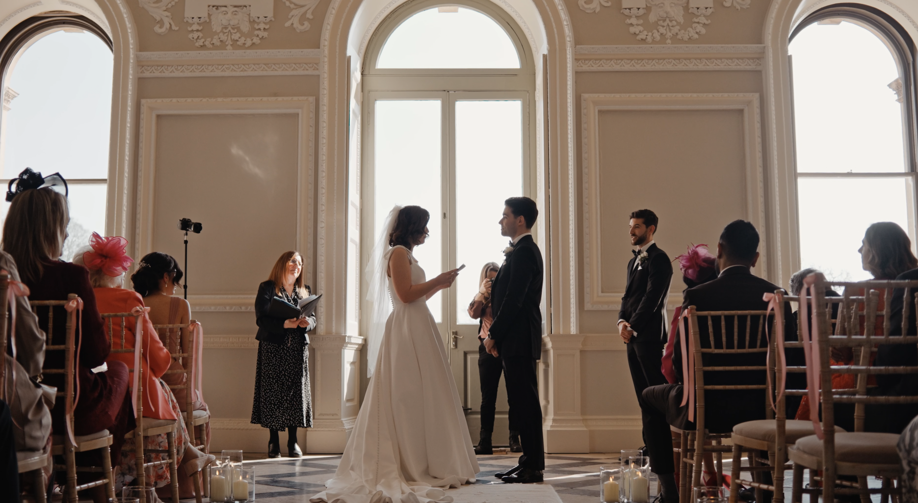 Bride reads heartfelt vows to groom during a classic wedding ceremony at Crowcombe Court.