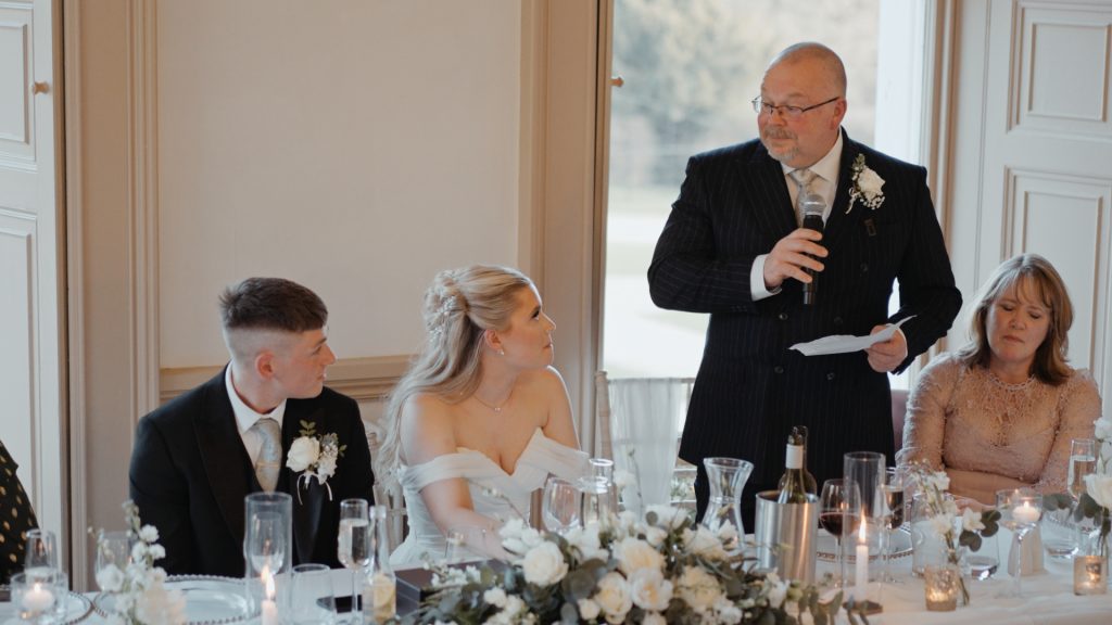 Father of the bride delivering a heartfelt wedding speech that brought guests to tears inside the elegant Crowcombe Court.