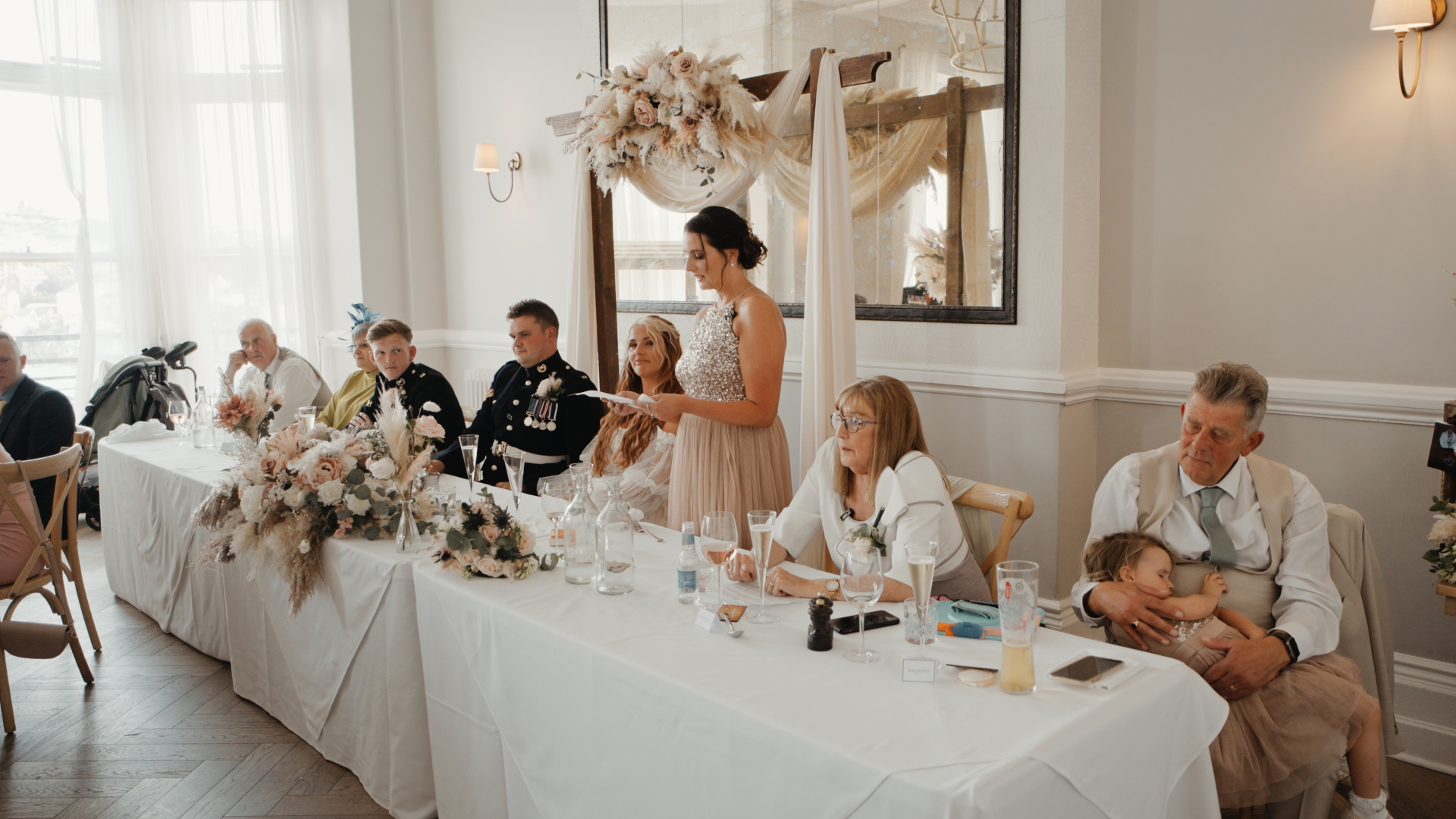 Maid of honour speech during Beth & Danny’s wedding reception with family at the top table.