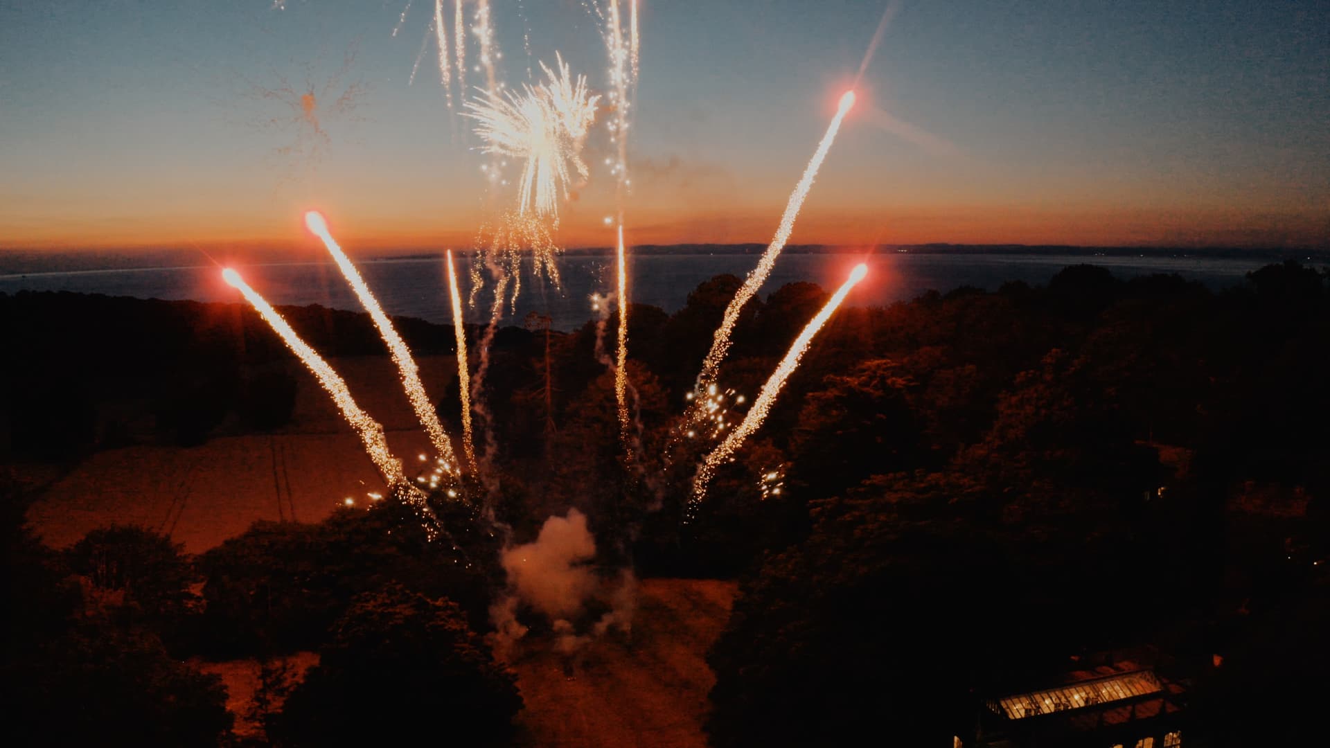 Fireworks light up the night sky over St Audries Park as guests celebrate the end of a perfect wedding day.