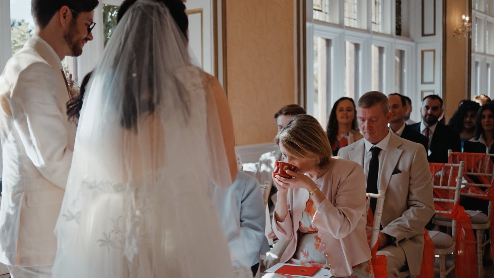 An emotional moment during the Taiwanese Tea Ceremony as family shares blessings at Holmewood Hall.
