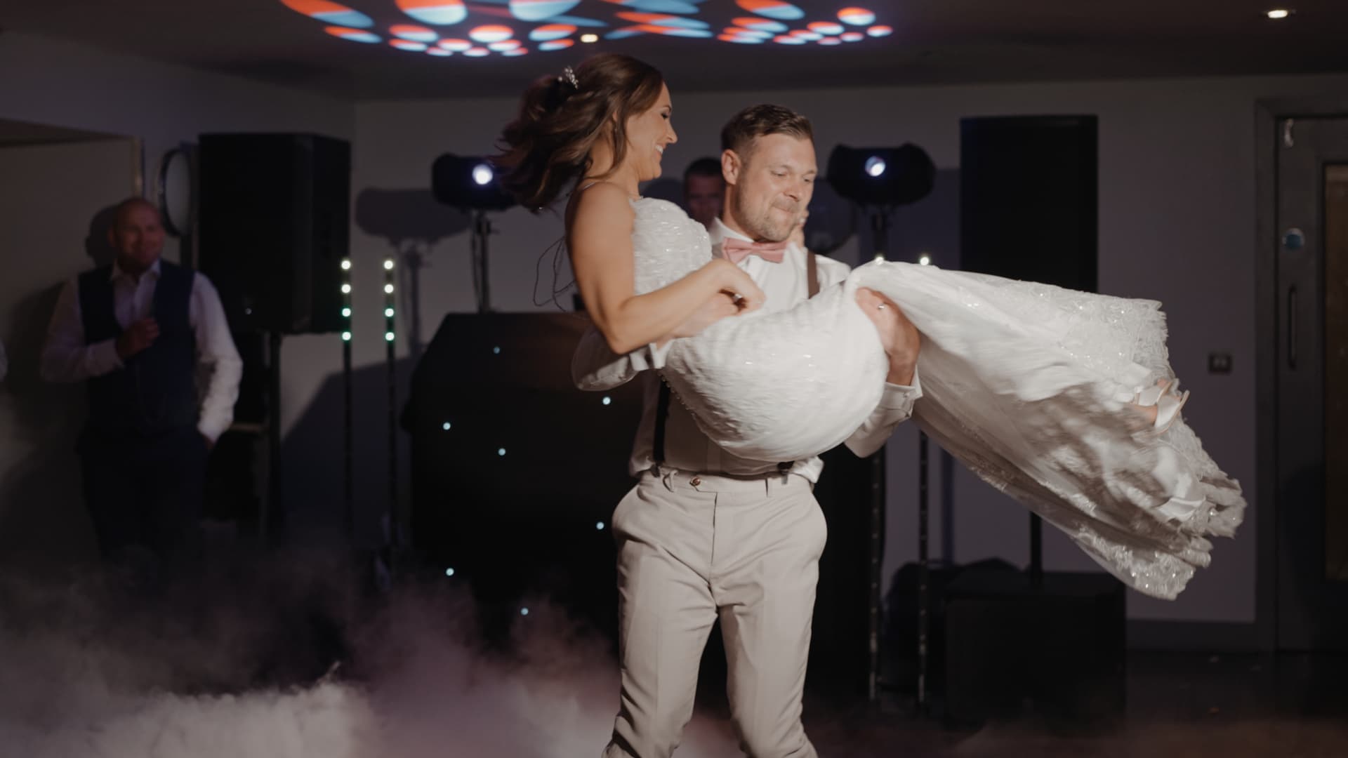 Groom lifting bride during their first dance filmed by a Somerset wedding videographer.