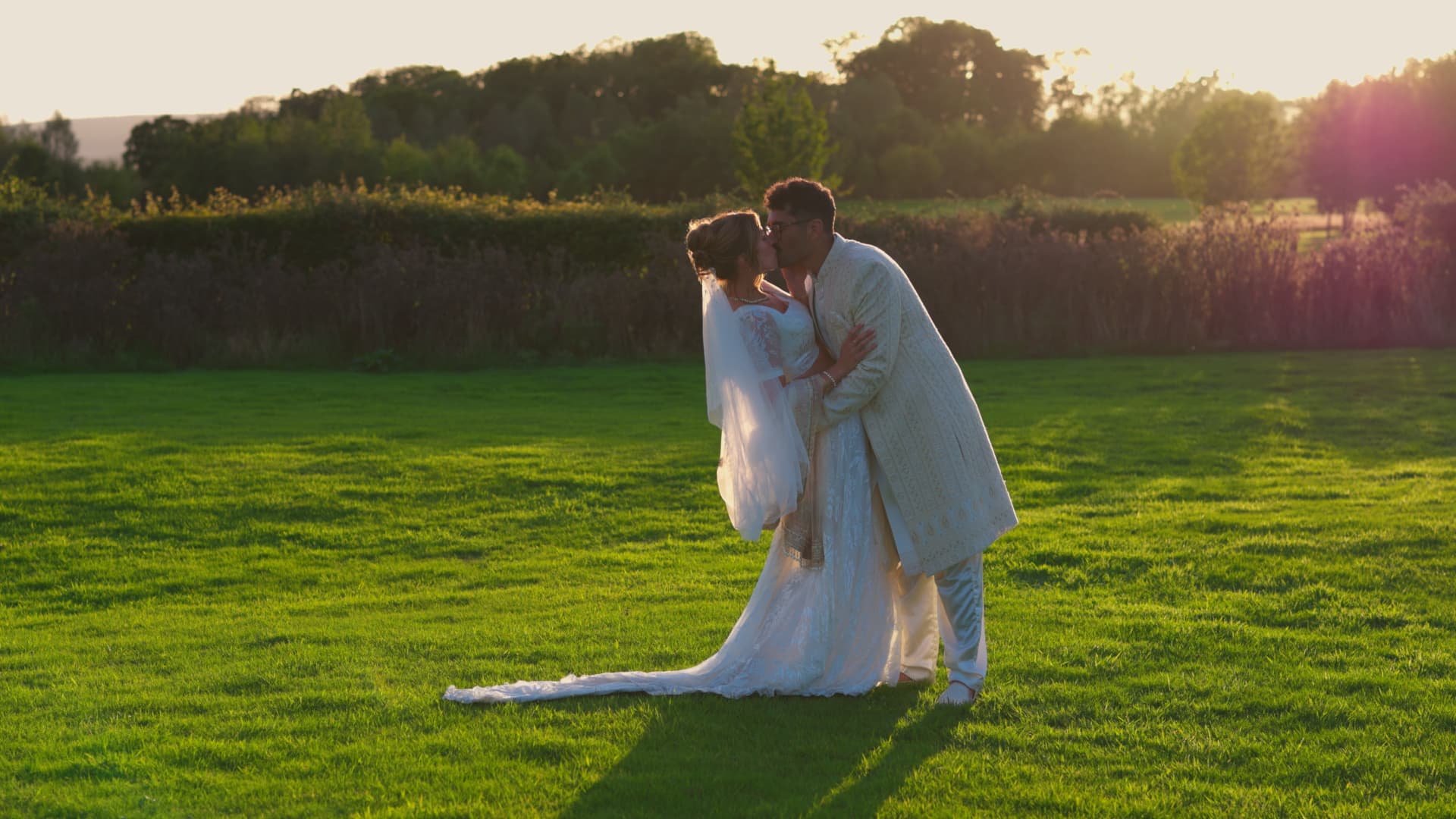 Katie and Shaunak sharing a quiet moment at sunset during their Naas Court Farm Wedding, filmed in the countryside grounds.