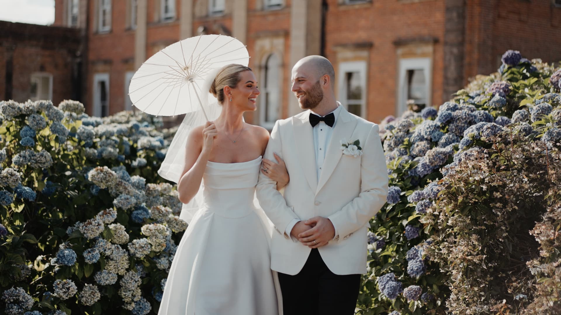 Elegant bride and groom portrait at Crowcombe Court, a Somerset wedding venue, filmed in a cinematic wedding film style by a wedding videographer specialising in UK wedding videography and luxury documentary storytelling.