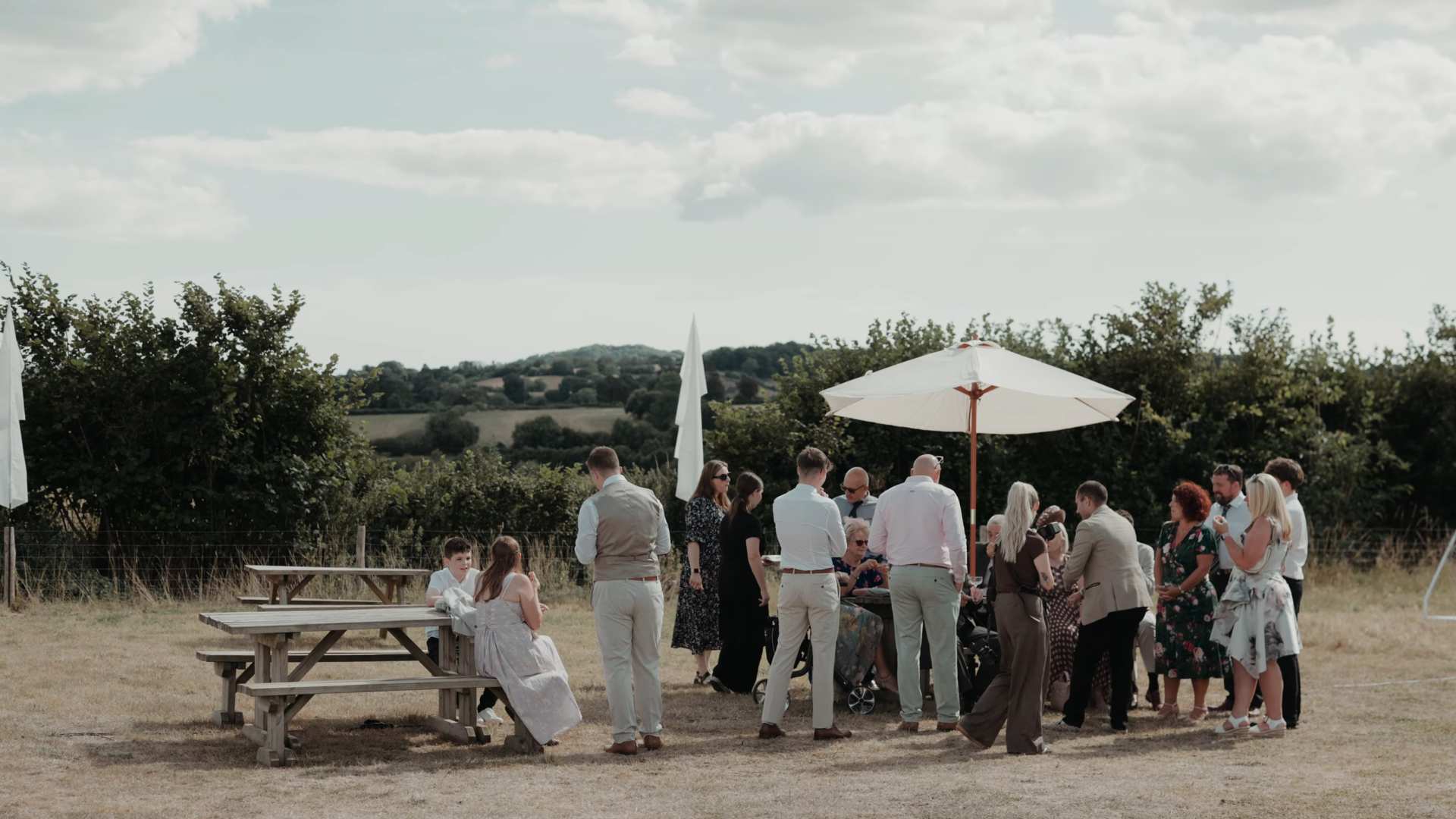 Wedding guests enjoy rolling countryside views at the Ark at Egwood, a Somerset wedding venue near Merriott